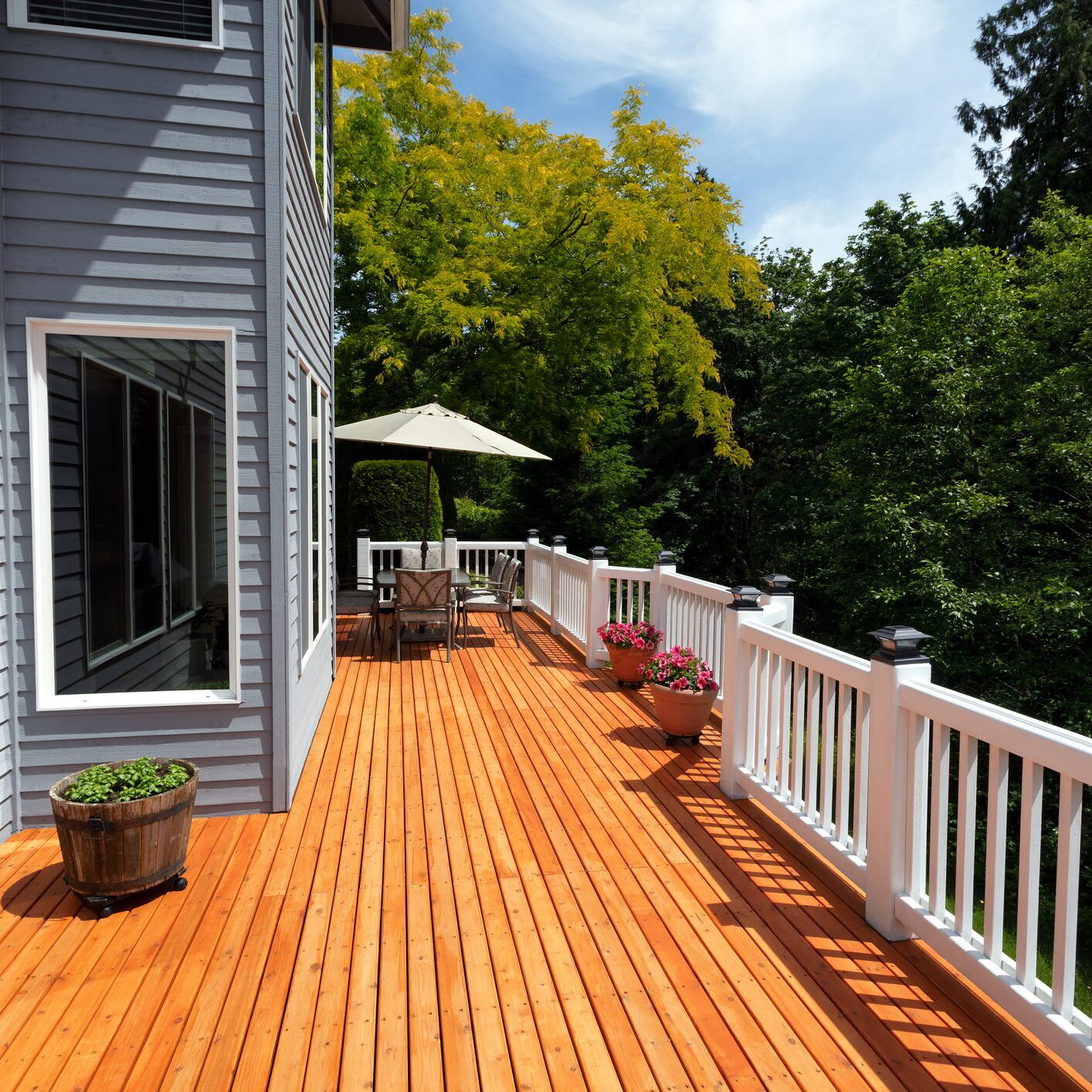New red cedar outdoor wooden deck during nice weather in horizontal layout