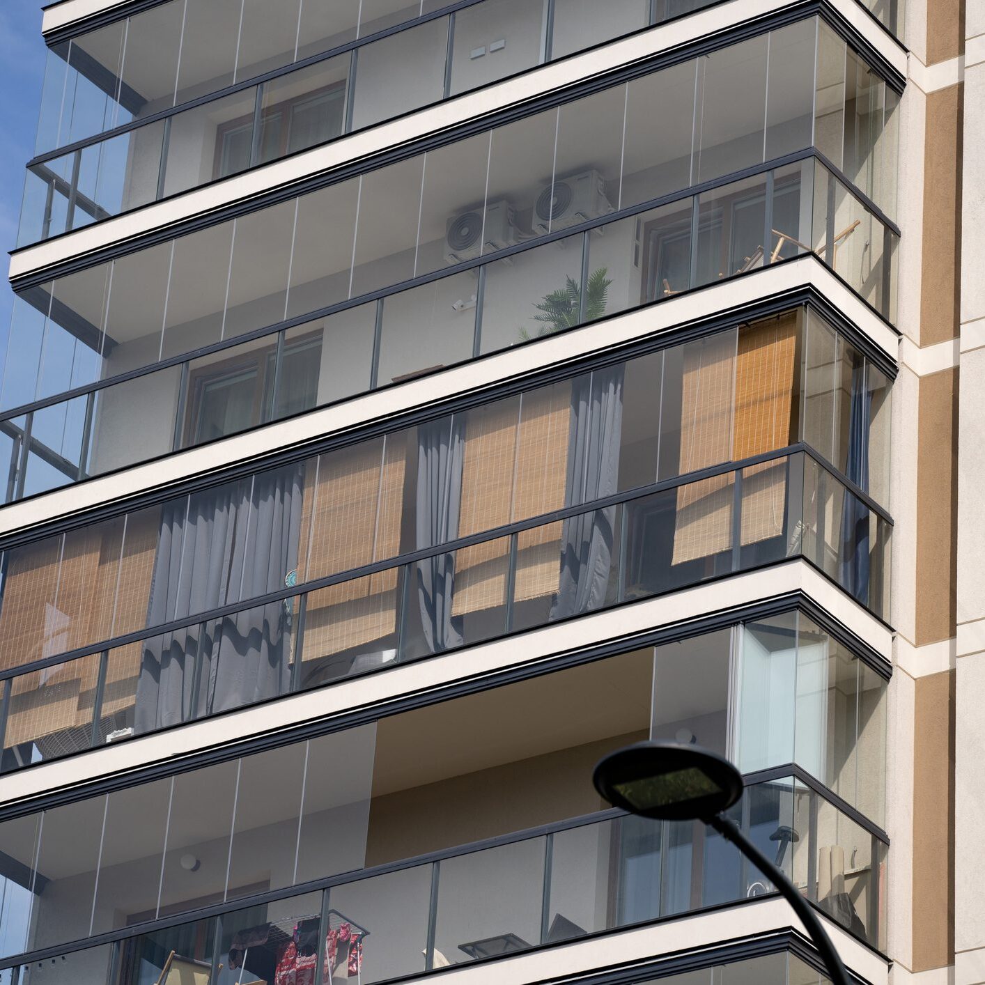 Covering the terrace with roller blinds against the sun